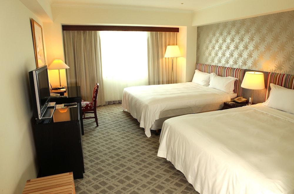 The Howard Plaza Hotel Kaohsiung Exterior foto A room at the hotel