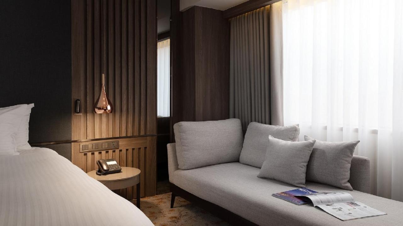 The Howard Plaza Hotel Kaohsiung Exterior foto A room at the hotel